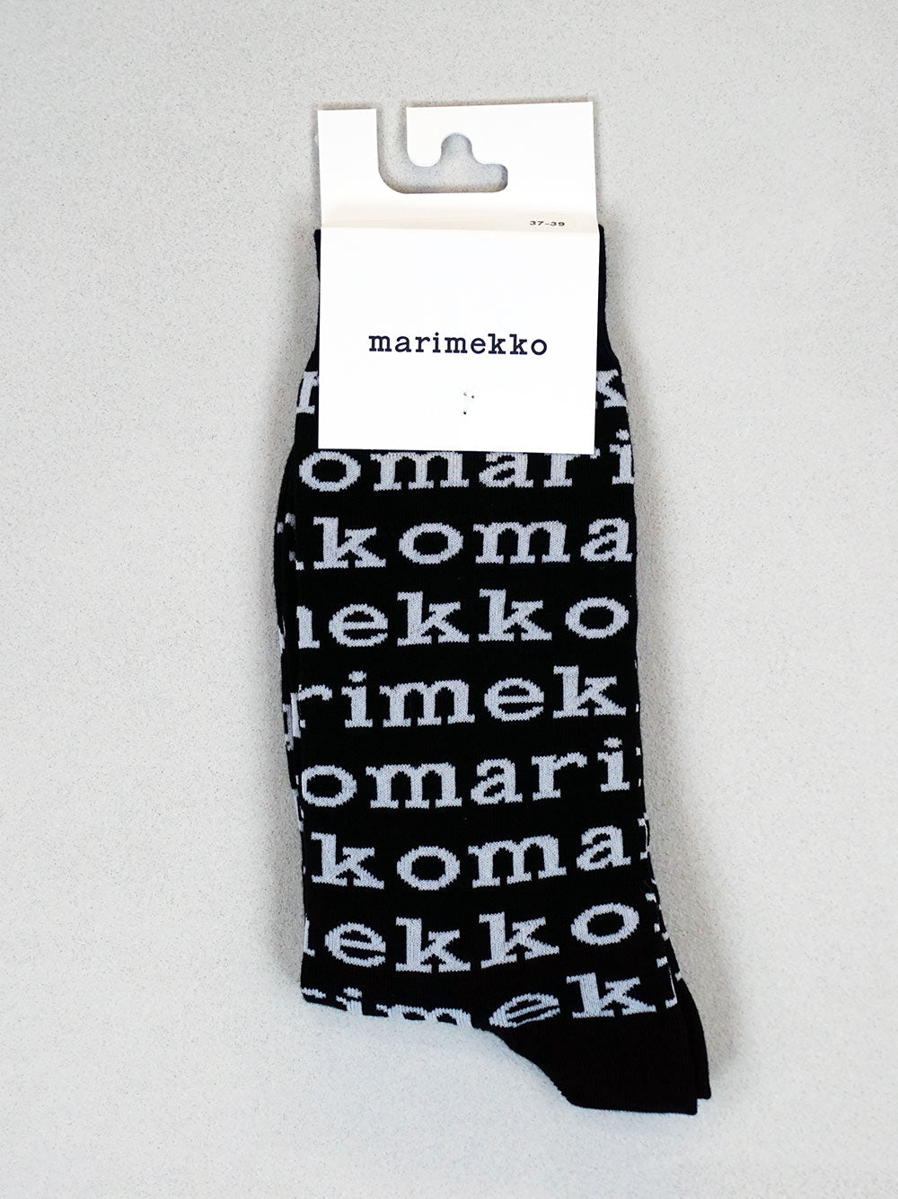 Fina strumpor med logotyp